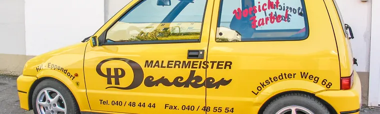 Fahrzeugbeschriftung mit geplotteten Folien auf einem Firmenwagen